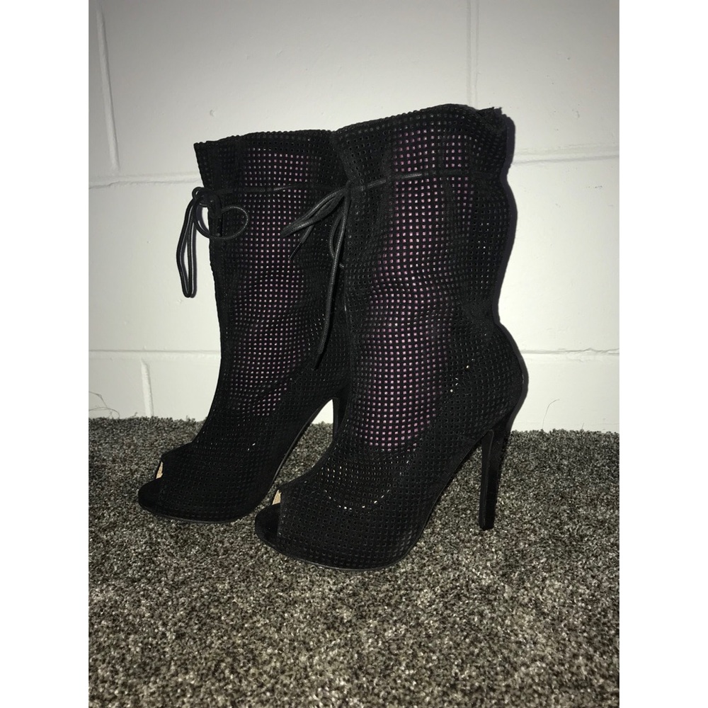 Black heels, never been worn!